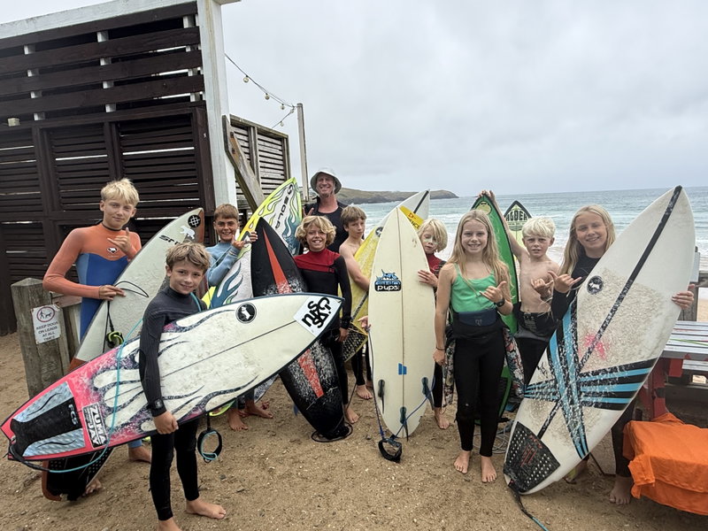 RSJ youth surfers heading out at a summer camp