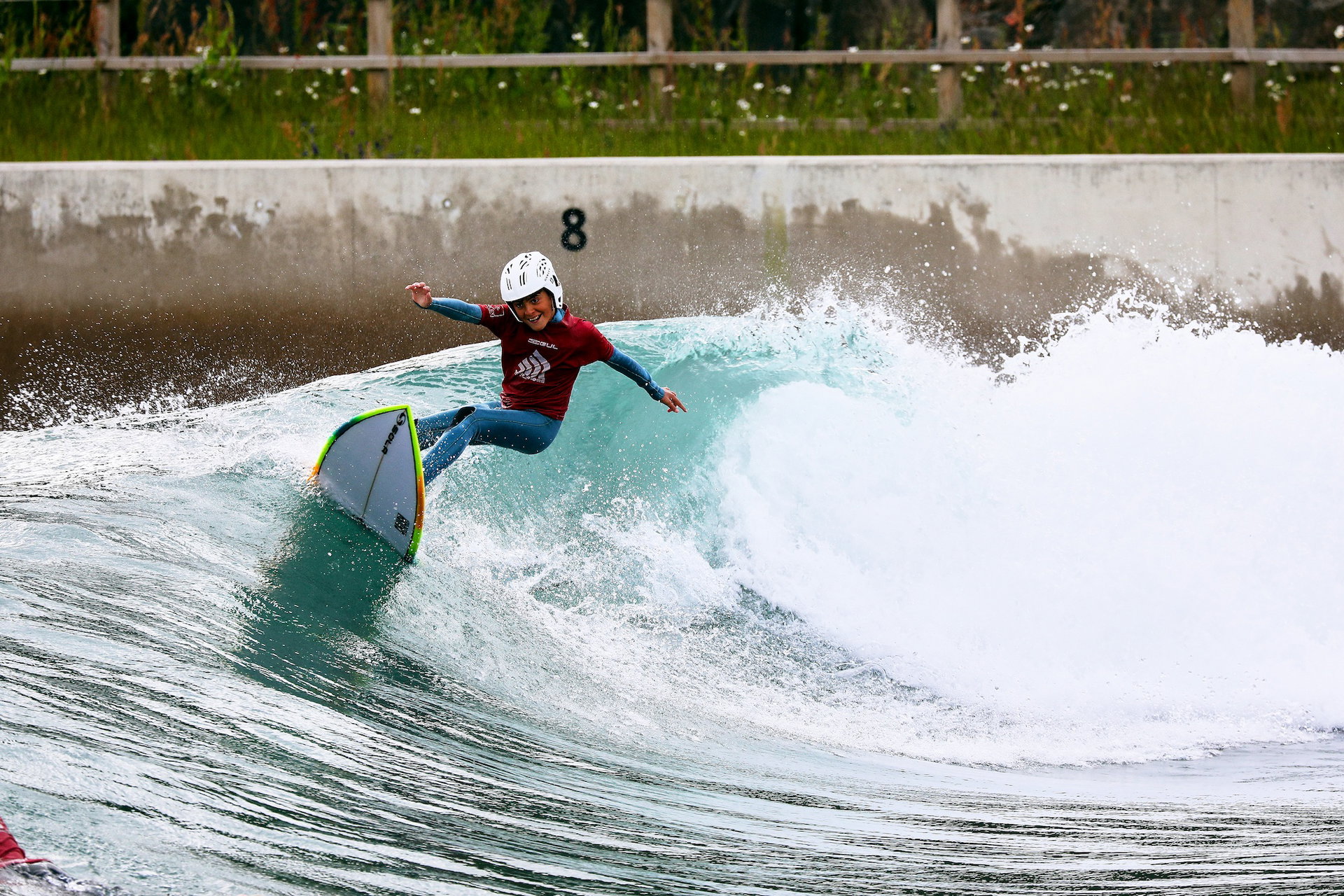 Young RSJ surfer turning on a wave