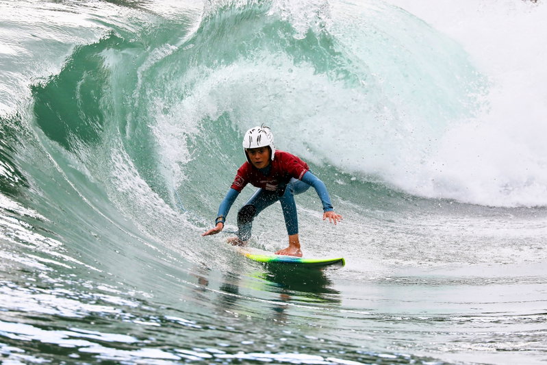 Young RSJ athlete surfing during a high performance camp